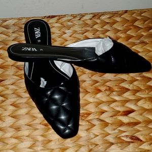Black quilted mules